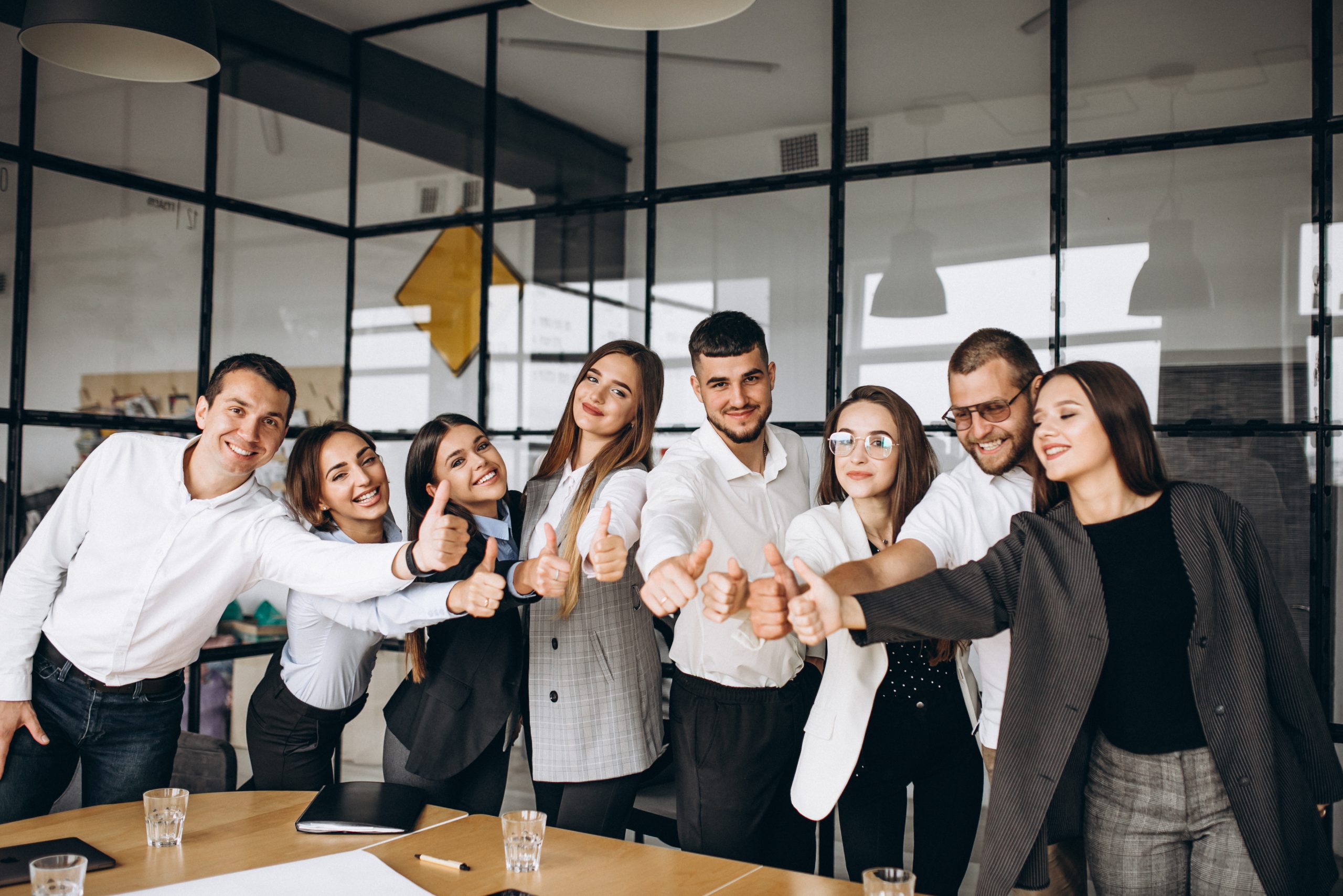 Group of people working out business plan in an office Group of people working out business plan in an office